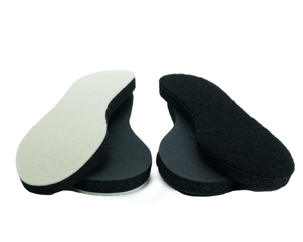 Cougar Paws replacement pads showing light colored and dark colored professional roofing boot traction pads with patented grip technology for Performer and Estimator boots